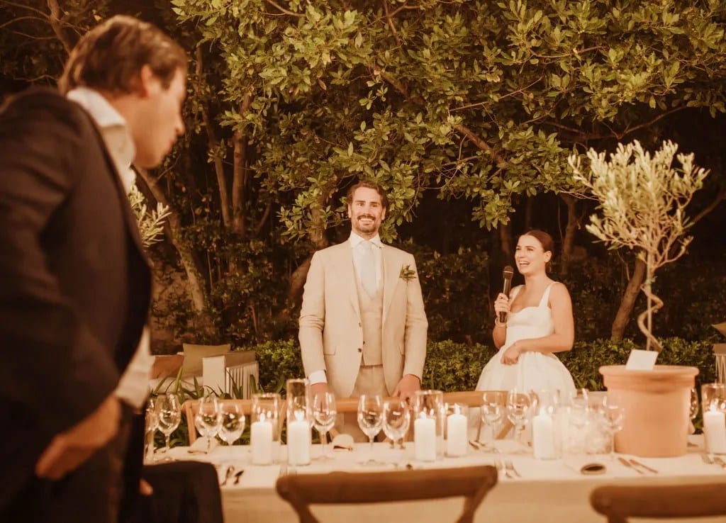 Candlelit dinner toast — the quiet service behind a beautifully held weekend